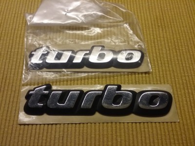 Klick um die Datei Embleme turbo Calibra-A u. Vectra-A.jpg in voller Größe zu öffnen